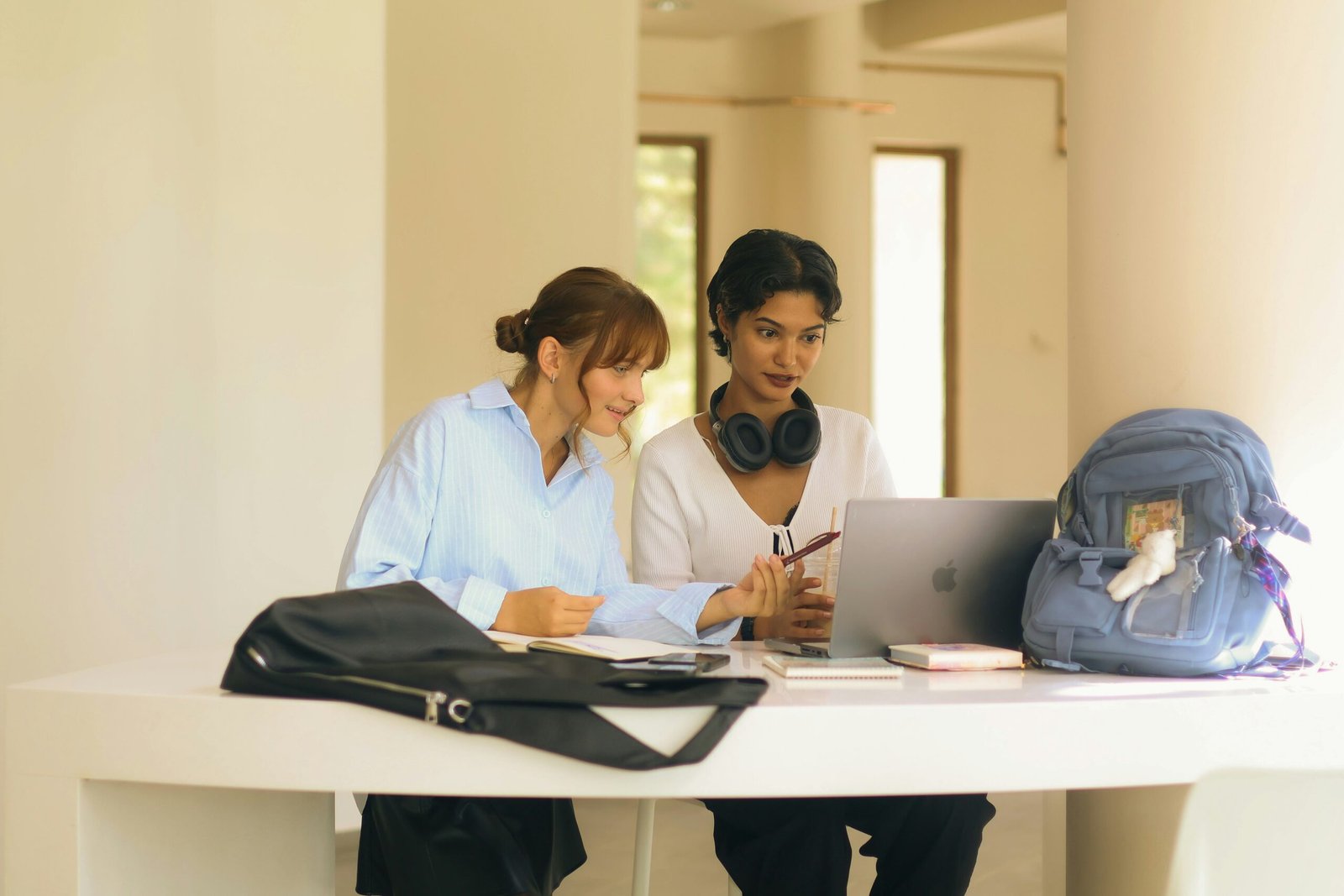University students and researchers discussing academic research